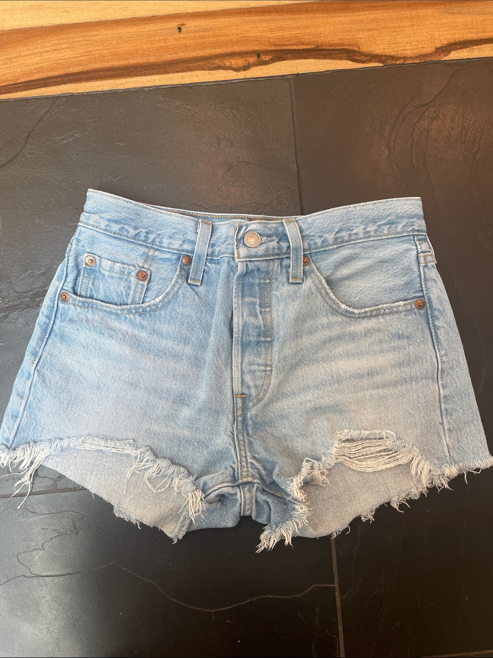 Levi’s Light Blue Distressed Denim Cutoff Shorts